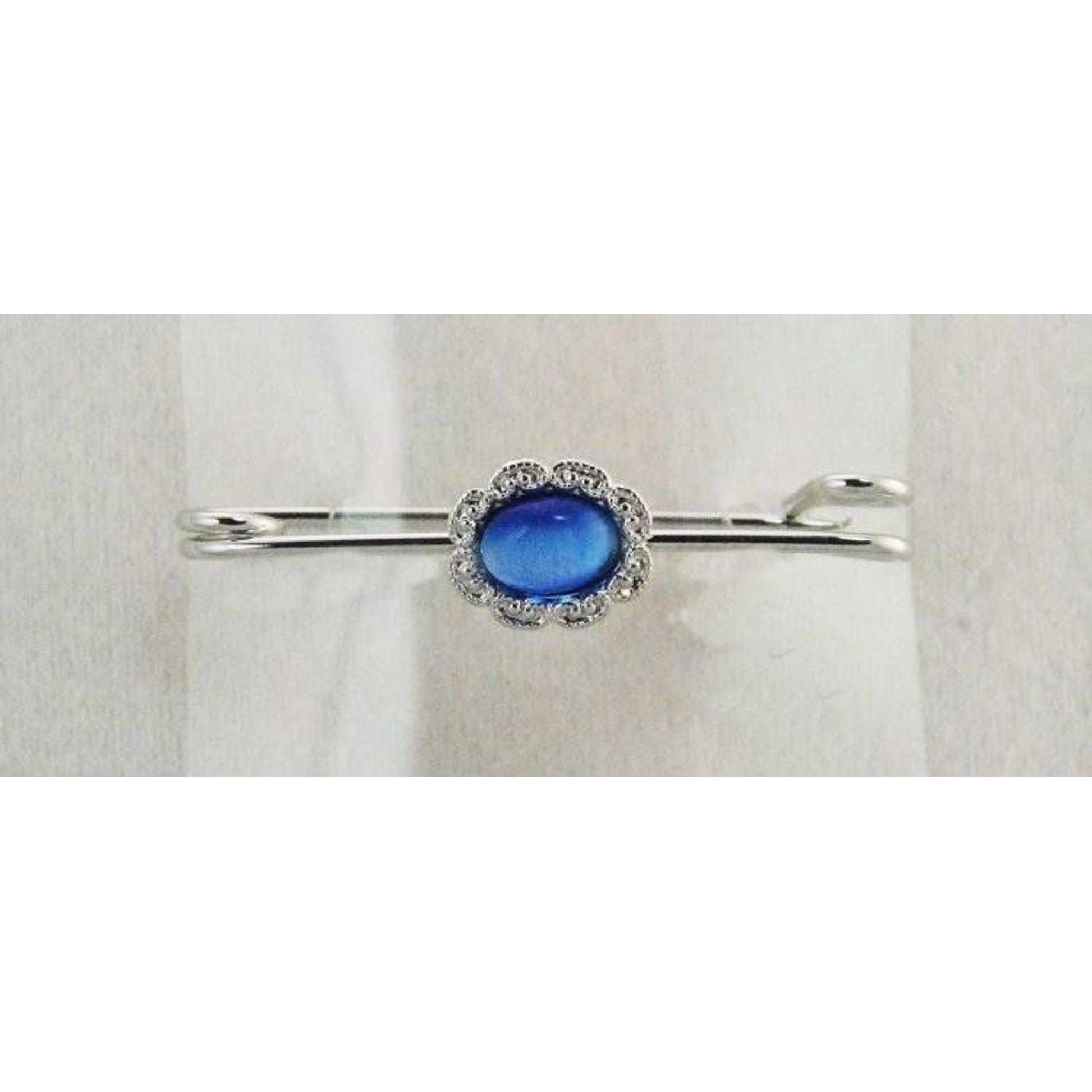 Finishing Touch Lt Sapphire Cats Eye Stock Pin